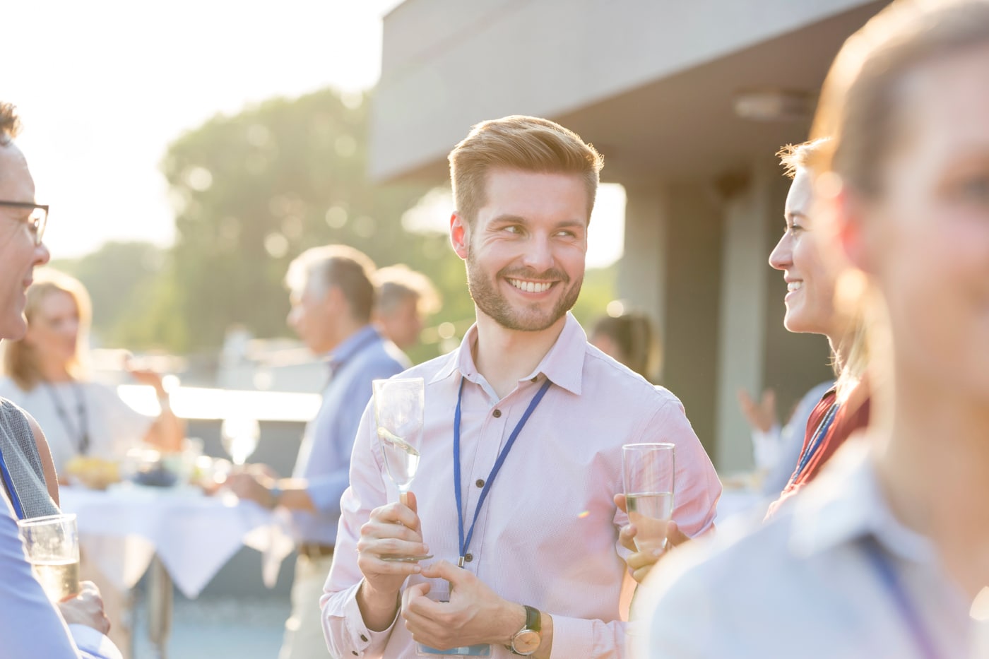 Guests talking at an outdoor event